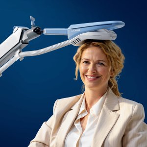 Patient Relaxing During Non-Invasive TMS Depression Treatment Without Medications Patient Relaxing During Non-Invasive TMS Depression Treatment Without Medications