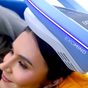 Patient Relaxing During Non-Invasive TMS Depression Treatment Without Medications Patient Relaxing During Non-Invasive TMS Depression Treatment Without Medications