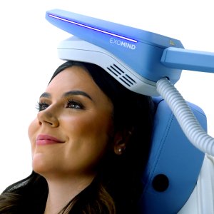 Patient Relaxing During Non-Invasive TMS Depression Treatment Without Medications Patient Relaxing During Non-Invasive TMS Depression Treatment Without Medications